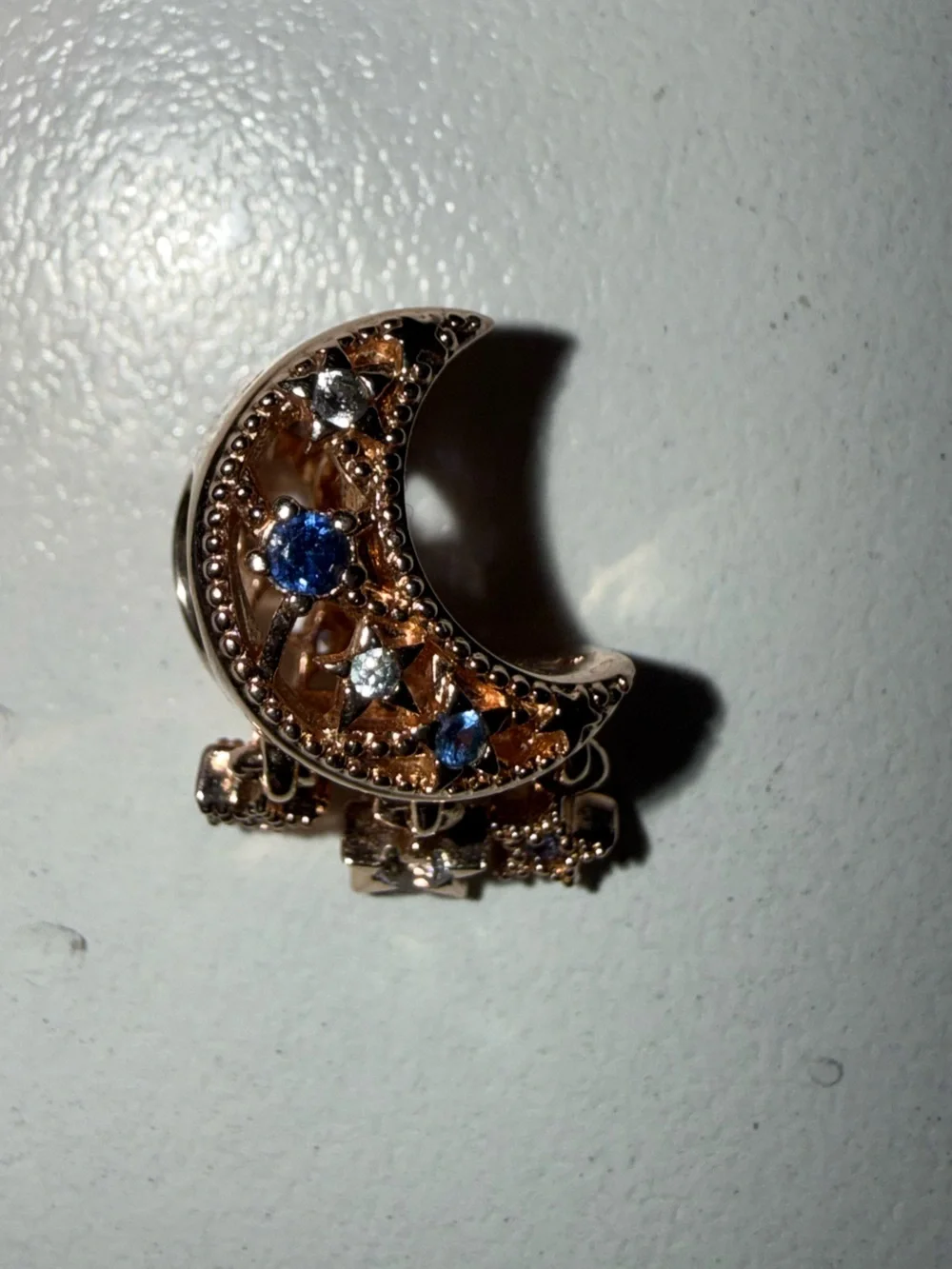 Pandora Rose Gold Crescent Moon Charm with Blue and Clear Stones